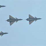 Posledn fotografie Yu Xu (a jejho letounu) ve vzduchu.