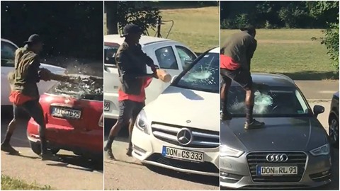 Nigerijec se vyřádil na autech před německým azylovým centrem. Nigerijec se vyřádil na autech před německým azylovým centrem.