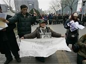 Čínské protesty v Pekingu u výročí Vyhlášení deklarace lidských práv (10. prosinec 2008) Čínské protesty v Pekingu u výročí Vyhlášení deklarace lidských práv (10. prosinec 2008)