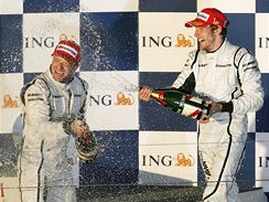 Jenson Button (vpravo) a Rubens Barrichello 