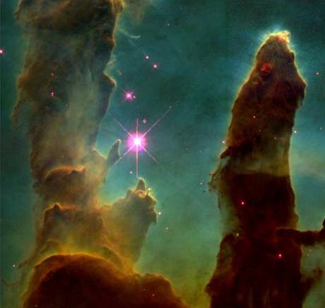 Hubblev teleskop: Mraky plynu, z nich se v Orl mlhovin rod hvzdy