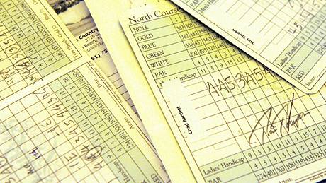 Golf score cards.