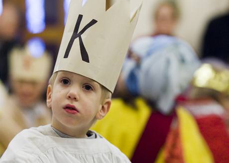 Kardinl Miloslav Vlk poehnal v Arcibiskupstv praskm kolednkm Tkrlov sbrky. (3. ledna 2009)