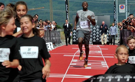 Usain Bolt pi charitativním bhu ve výcarsku
