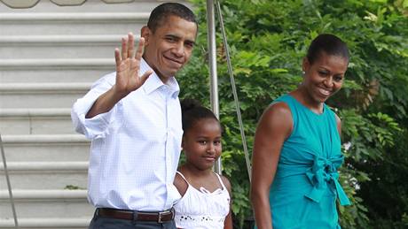 Barack Obama s manelkou a dcerou Sashou na dovolené v Panama City. (14. srpna 2010)