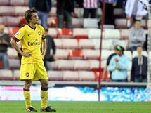 SMUTN KAPITN. Tom Rosick z Arsenalu v zpase se Sunderlandem nedal penaltu a soupe v posledn minut vyrovnal.