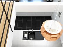 Prhled z patra do kuchyn byl dal architektv dobr npad. Kuchy je dky tomu dostaten osvtlena dennm svtlem. Mezi patry vis velk mdn lampa "ika", kterou navrhl designr Poul Henningsen. 