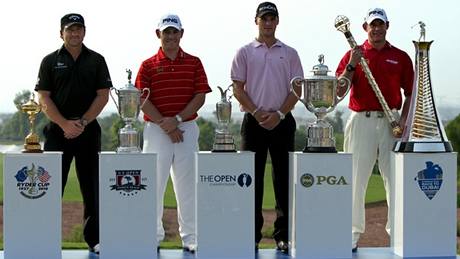 Golfové trofeje a jejich majitelé. Zleva: Ryder Cup, Graeme McDowell, US Open Cup, Louis Oosthuizen, Claret Jug, Martin Kaymer, Wannamaker Trophy, Lee Westwood s Dubai World Championship, Race To Dubai Trophy. Golfové trofeje a jejich majitelé. Zleva: Ryder Cup, Graeme McDowell, US Open Cup, Louis Oosthuizen, Claret Jug, Martin Kaymer, Wannamaker Trophy, Lee Westwood s Dubai World Championship, Race To Dubai Trophy.