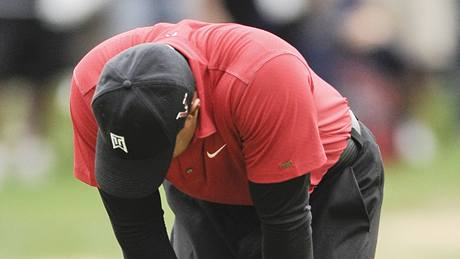 Tiger Woods el do finále s náskokem ty ran, pesto jeho turnaj vyhrál Graeme McDowell.