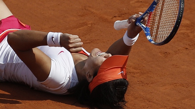 ínská tenistka Li Na se raduje z vítzství na Roland Garros.