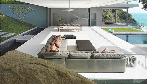 Architekti zalenili ulovou skálu pímo do prostoru obývacího pokoje.