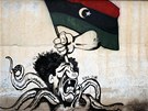 Karikatura Muammara Kaddfho v Benghz (5. ervence 2011)