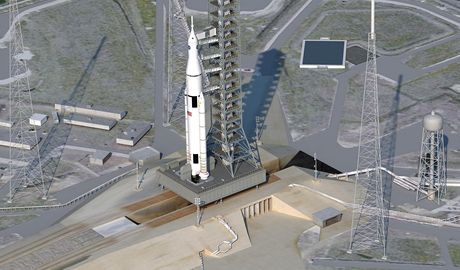 Ilustrace raketového nosie SLS na startovací ramp