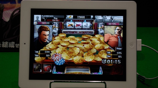 Mobilní hry a aplikace na Tokyo Game Show 2011 - speciální nástavec zmní mobil v puku.