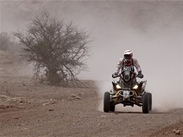 Jednou z mála en letoní Rallye Dakar je Camelia Liparoti se tykolkou Yamaha.