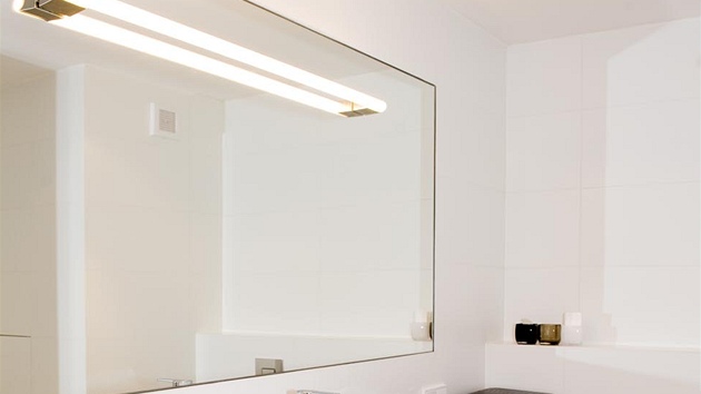 V nábytkové sestav koupelny je integrovaná praka, která je z estetického