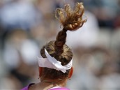 COP. Fotografa zaujaly dlouh vlasy esk tenistky Petry Kvitov svzan do