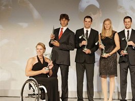 NEJLEPÍ.  Nejlepí tenisté roku 2011 na slavnostní paíské veei (zleva):...