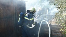 Osm vyhoelých chatek mají v Západní ulici na svdomí bezdomovci.