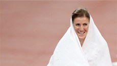 Olympijskou medaili oslavila Zuzana Hejnová s eskou vlajkou. Mávala s ní,