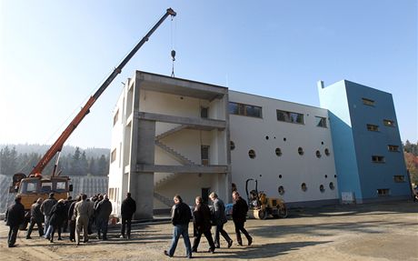 Nová budova Office Area, kde budou mít zázemí poadatelé, závodníci, jejich...