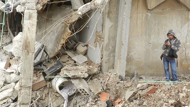 Rozbombardovan domy v Homsu (6. prosince 2012)
