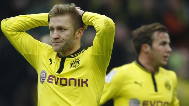 DRBE SI HLAVU. Jakub Blaszczykowski, polsk fotbalista Dortmundu, pedvd zklamanou grimasu v utkn s Hamburkem.