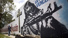 Ježíš se samopalem. Graffiti v ulicích Caracasu Ježíš se samopalem. Graffiti v ulicích Caracasu
