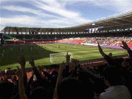 Jedním z nejpopulárnjích sport je fotbal. Moderní stadion Akhmad Arena s...