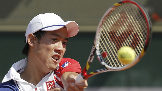 Japonsk tenista Kei Niikori v duelu s Kanaanem Jessem Levinem.