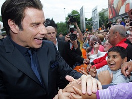 Herec John Travolta na zahájení 48. roníku mezinárodního filmového festivalu v...