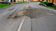 Silnice ve Slánské ulici v obci Smečno na Kladensku. Silnice ve Slánské ulici v obci Smečno na Kladensku.