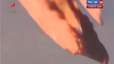 Rozpadající se trosky ruské rakety Proton-M na zábrech ruské stanice Rossija 24