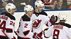 Hokejisté New Jersey se radují z gólu. Zleva: Bryce Salvador, Marek Židlický, Hokejisté New Jersey se radují z gólu. Zleva: Bryce Salvador, Marek Židlický,