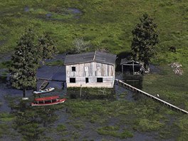 A fisherman's house is seen along the Tapajos River, a tributary of the Amazon,...