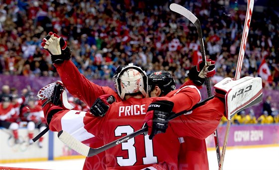Kanadtí hokejisté slaví zisk olympijské medaile, ilustraní foto