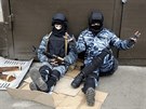 Písluníci speciálních jednotek Berkut prohlásili, e proti demonstrujícím...