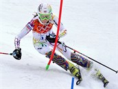 esk lyaka rka Strachov pi prvn jzd olympijskho slalomu. (21. nora...