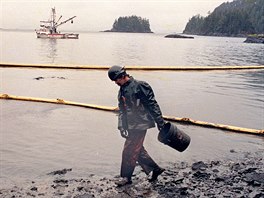 9 In this April 17, 1989, file photo, a worker makes his way across the...