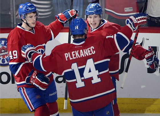 Hokejisté Montrealu Brendan Gallagher (vpravo), Tomá Plekanec a Michael