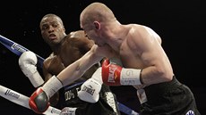 TVRDÝ BOJ. Lukáš Konečný (vpravo) a Peter Quillin bojují o titul mistra světa TVRDÝ BOJ. Lukáš Konečný (vpravo) a Peter Quillin bojují o titul mistra světa