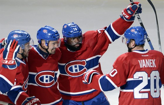 Thomas Vanek (20), P. K. Subban (76), Tomá Plekanec (14) a Josh Gorges slaví...