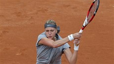 Petra Kvitová a její razantní úder v utkání s Marinou Erakoviovou.