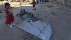 Trosky vládní stíhaky v Benghází. MiG se zítil a explodoval bhem úterních...
