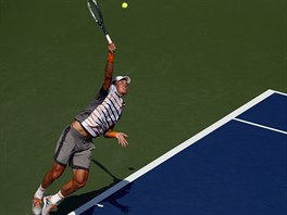 Tom Berdych v duelu 1. kola US Open s Lleytonem Hewittem z Austrlie.