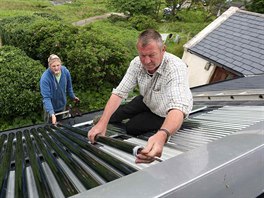 the roof of a cottage on the island of Eigg, Inner Hebrides, Scotland May 28,...
