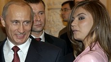 Ruský prezident Vladimir Putin a bývalá olympijská vítězka v moderní gymnastice... Ruský prezident Vladimir Putin a bývalá olympijská vítězka v moderní gymnastice...