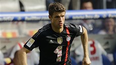 Momentka Thomase Müllera z Bayernu Mnichov v utkání s Hamburkem
