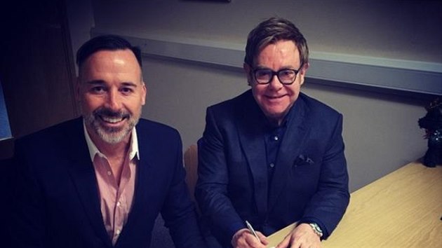 David Furnish a Elton John uzaveli manelstv (Windsor, 21. prosince 2014).