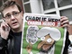 Stphane Charbonnier (Charb) s kontroverznm vydnm Charlie Hebdo, kter vedlo...